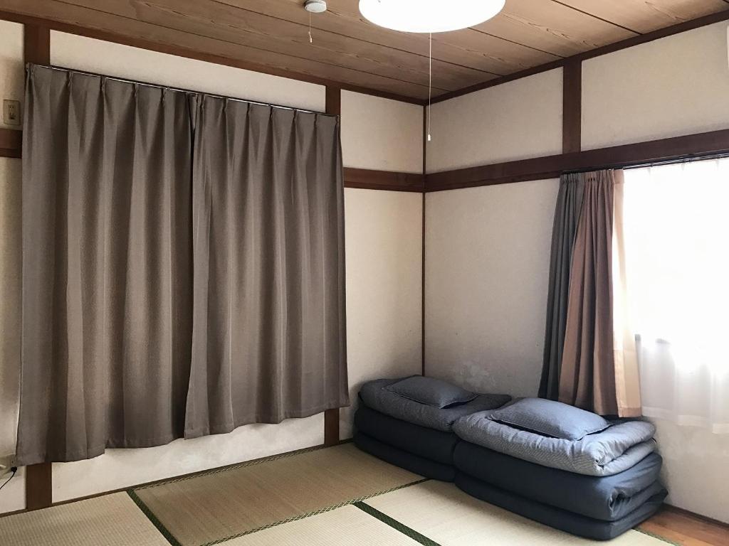 Golden Mile Apartment Amami Exterior foto